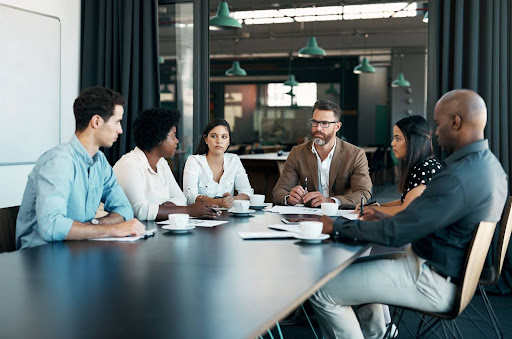Business owners discuss call center operations with their nearshore outsourcing partners.