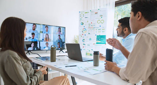 Business leaders hold a video call with offshore outsourcing patterns.