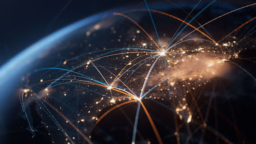 A visualization of the earth from space, showing the spread of call centers and communication from city to city.
