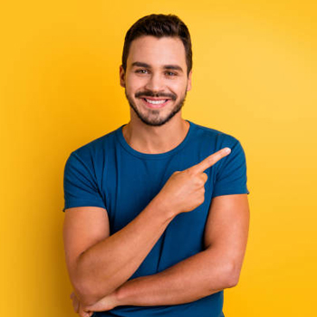 man in front of yellow bg