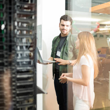 coworkers in server room