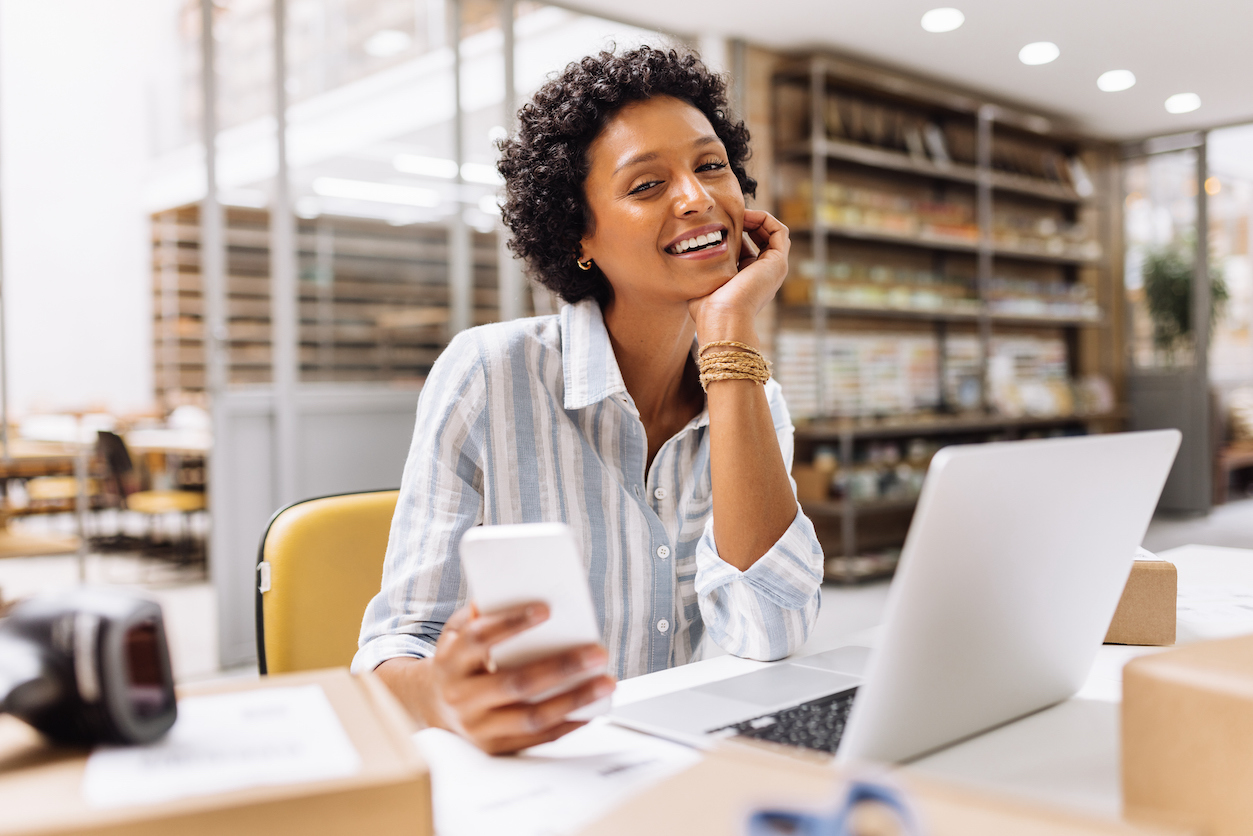 a BPO outsourcing agent working with their phone in hand