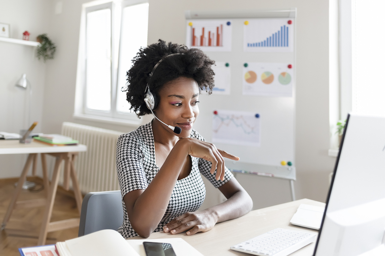 a call center employee working from home, implementing some critical call center skills