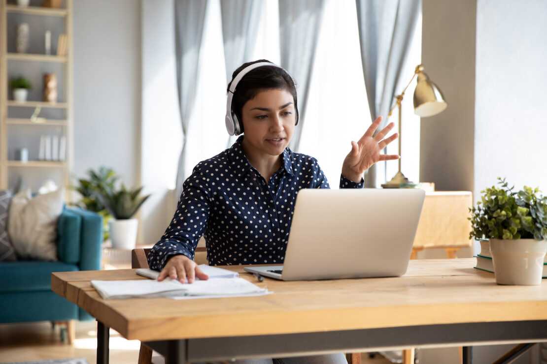 a customer service outsourcing specialist working at their computer