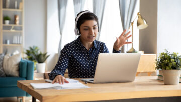 a customer service outsourcing specialist working at their computer