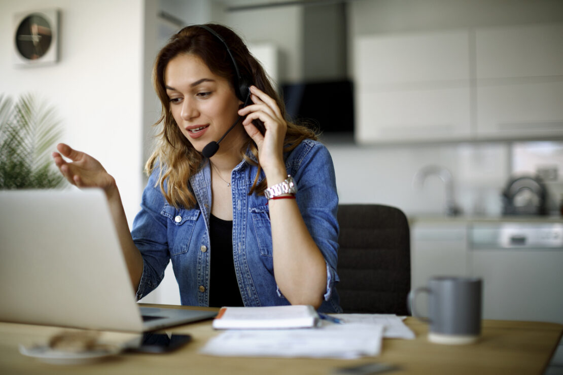 a call center agent utilizing their customer service skills to provide a great customer experience