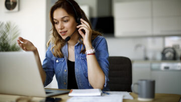 a call center agent utilizing their customer service skills to provide a great customer experience