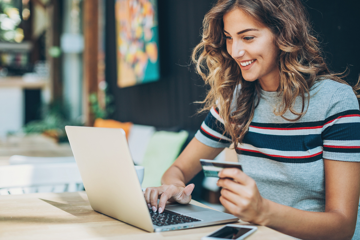 a person about to use their computer to make a purchase from a customer obsessed company