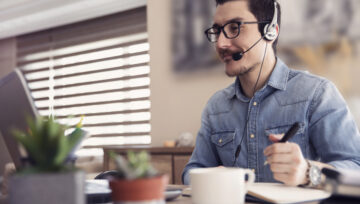 a blended call center agent working at their desk