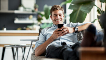 a customer looking happy after interacting with a call center who understands branding