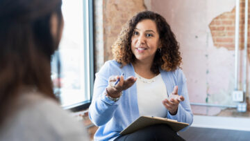 a call center agent training another team member