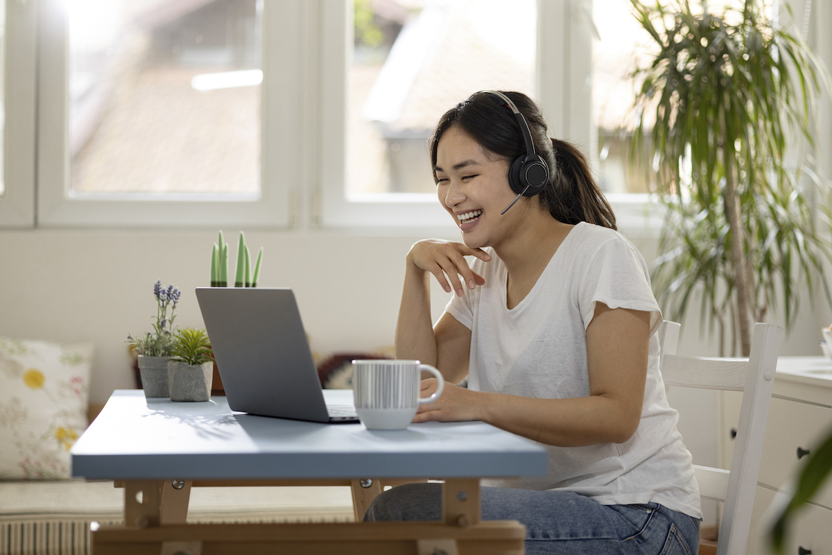 a call center agent working from their home as part of a company with a good call center culture