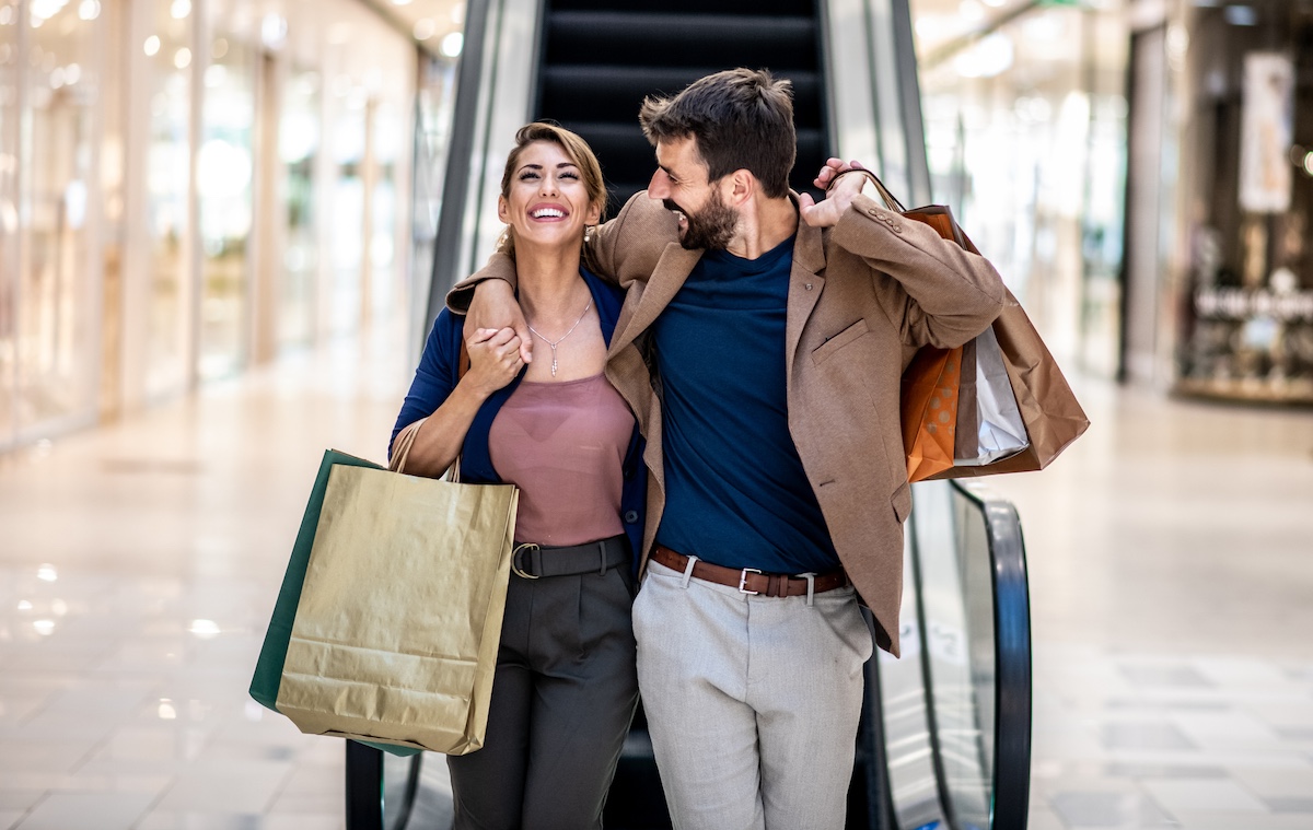 a couple shopping, benefiting from a luxury clienteling experience.