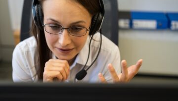 a call center agent working in a multilingual call center support environment.