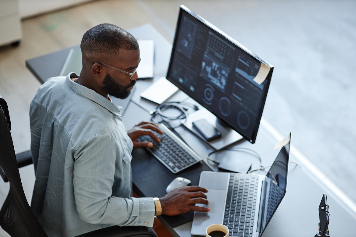 a help desk outsourcing agent working at their desk