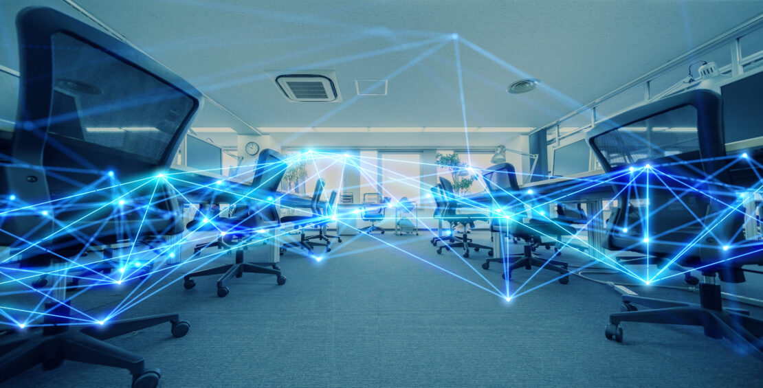 A modern-looking contact center with a network of blue lights superimposed to symbolize its modern tech and connectedness.