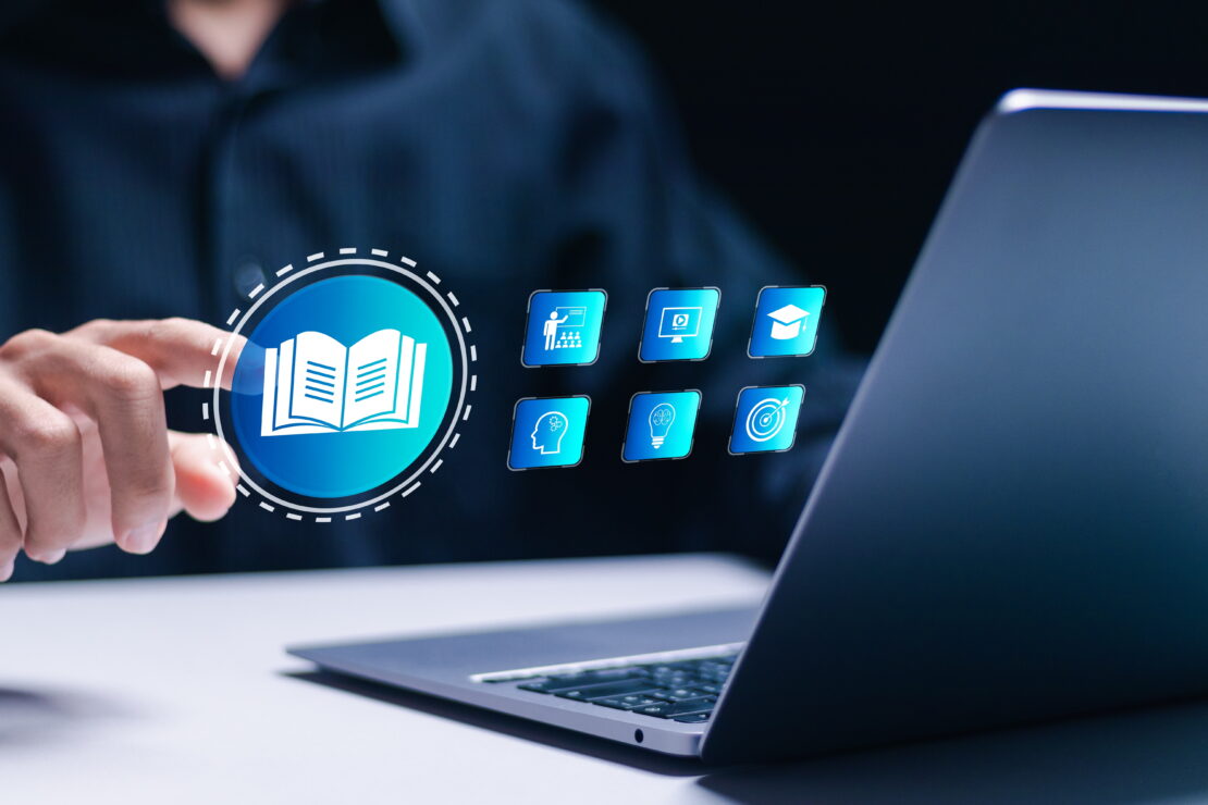 Man tapping floating book icon alongside 6 other icons