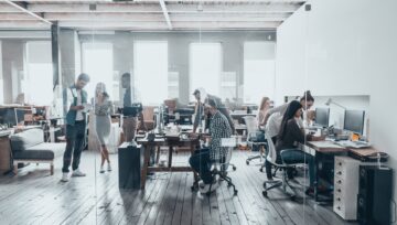 modern office with employees working at desks