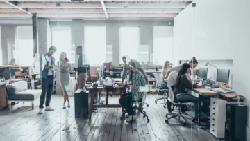 modern office with employees working at desks