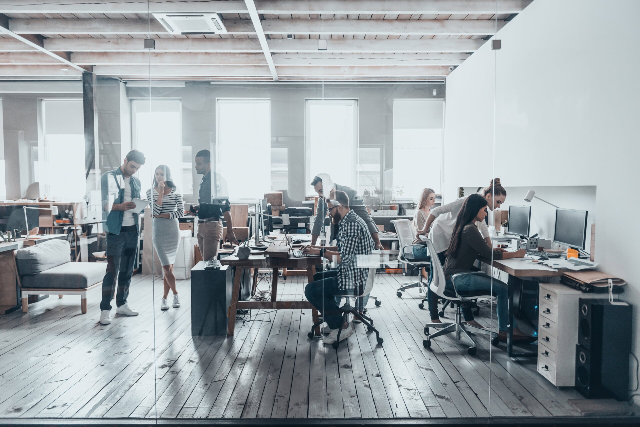 modern office with employees working at desks