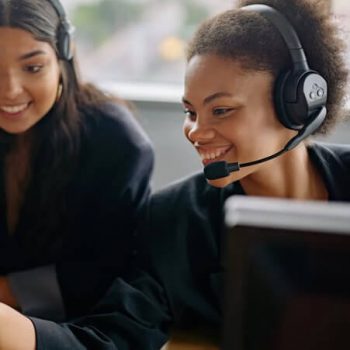call center outsourcing agents working at their computers