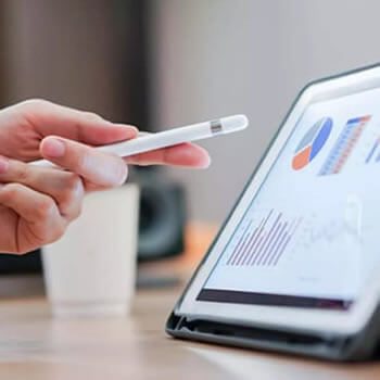 reports and graphs on a laptop screen