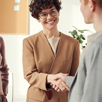 business partners meeting about the benefits of hiring a call center outsourcing company