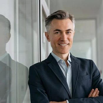 a call center outsourcing client, smiling at the camera